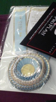 Blue ribbons are given to the "Select" animals - one for a male and one for a female.