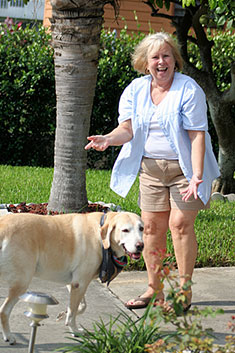 Lady giving up on teaching commands to a dog