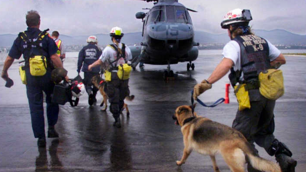 A team from Miami-Dade’s Urban Search and Rescue Task Force runs to board a U.S. Marine helicopter in response to a devastating earthquake in Turkey in 1999. Photo from Miami Herald Archives